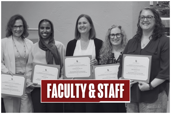 Black and white image of five faculty, and staff members smiling together as the hold IEPA Team of the Year Award certificates. Title on image says "Faculty & Staff".