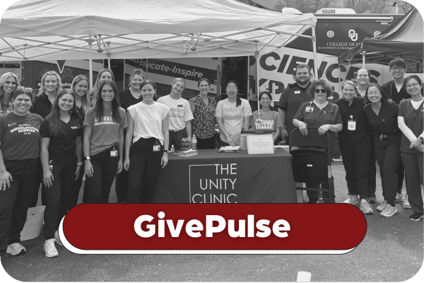 Black and white image of students, faculty, and staff smiling in front of the MOV at an outreach event. Title on image says "Give Pulse".