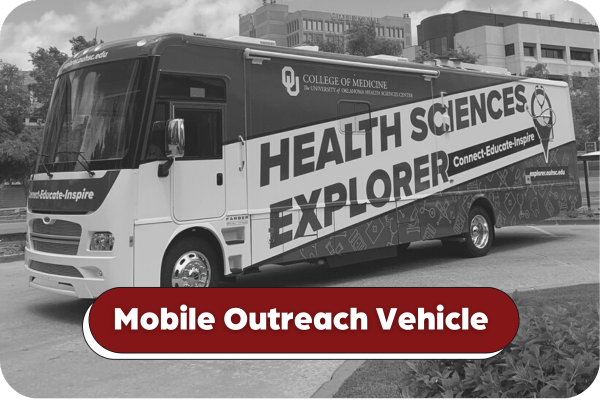 Black and white image of a large bus parked on the HSC Campus. Title on image says "Mobile Outreach Vehicle".